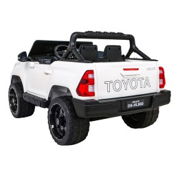 Toyota Hilux na akumulator dla dzieci Biały Pickup + Napęd 4x4 + Pilot + 2 bagażniki